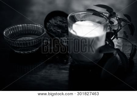Face Mask Of Devil's Dung Powder On Wooden Surface I.e. Hing Powder Well Mixed With Honey And Milk.u