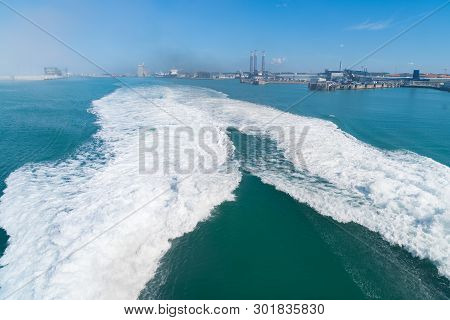 Ferry Boat Leaving The Harbor Of Hirtshals Denmark Leaving A Double Wash
