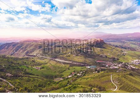 Ancient Calascibetta Landscape City On Rock, Sicily, Italy. Sunset Aerial Photo.