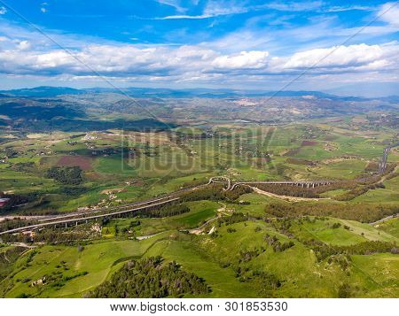Expressway Highway Sicily Island Italy, Near City Of Enna. Blue Sky With Clouds.