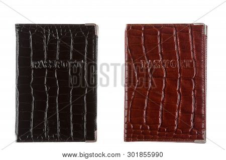 Two Cover Made From Crocodile Skin For Your Passport, Isolated On White Background. Passport On Whit