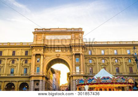 Arch Between Buildings And Vintage Carousel On Piazza Della Repubblica Republic Square In Historical