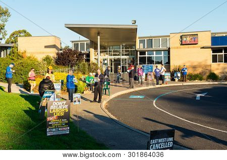Melbourne, Australia - May 18, 2019: Political Party Supporters Handing Out How To Vote Cards Outsid