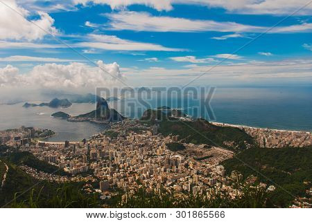 Rio De Janeiro, Sugar Loaf, Brazil: Mountain Resembling Inverted Funnel Behind Urca Hill. Tourist Si