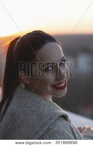 Girl Enjoying The Sunset