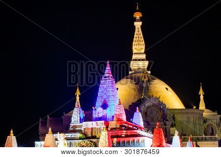 Architecture Of Wat Bunglatthiwan In Ayutthaya, Thailand On Vesak Day With Colour Light Decor Around