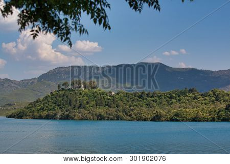 Khanpur, Pakistan - May 2019: A View Of A Lake Next To The Mountains