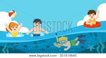 Happy Kids Play And Swim In The Sea. A Little Boy Diving With Fish Under The Ocean. Kids Having Fun 