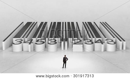 Young businessman standing in front of a big codebar