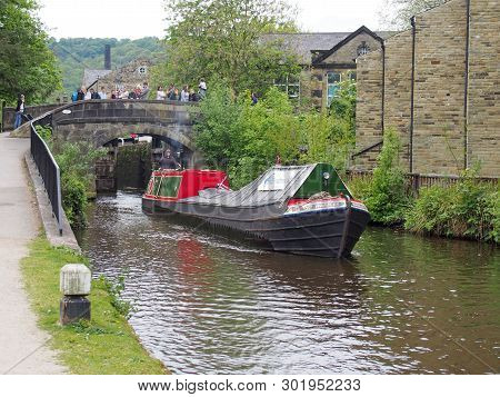 Hebden Bridge, West Yorkshire, England - 19 May 2019: Vintage Boats Traveling To The Historic Narrow
