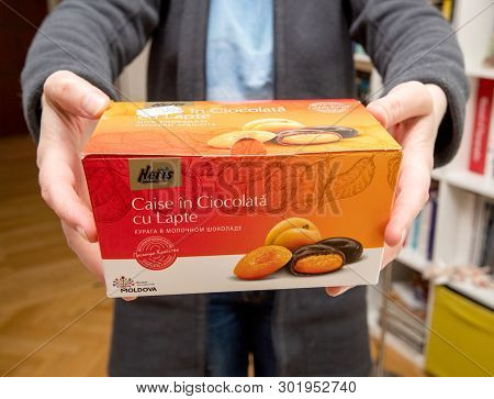 Paris, France - Apr 27, 2019: Woman Holding Moldovan Sweets Manufactured By Nefis Apricot Chocolate 