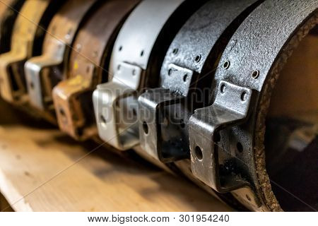 Vintage Antique Automotive Remanufactured Brake Shoe Linings Stacked