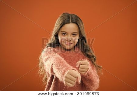 Girl Hold Fists Ready Attack Or Defend. Girl Child Cute But Strong. Self Defense For Kids. Defend In