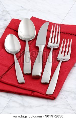 Beautiful Silverware On Fine Napkin