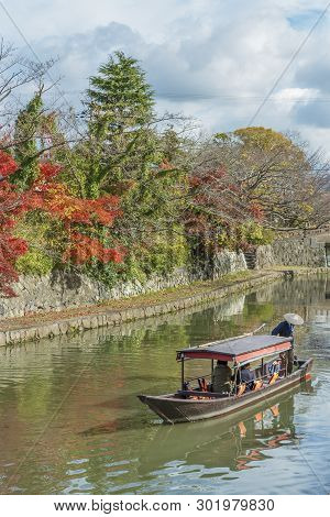 Tourist On Boat Sightseeing Around Hachiman-bori Canal In Omihachiman, Japan