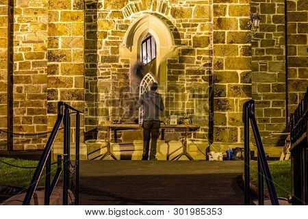 Men Are Reapiring Historic Church Window In Donegal Town - Ireland