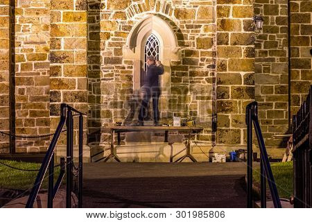 Men Are Reapiring Historic Church Window In Donegal Town - Ireland