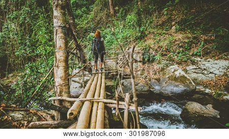 Woman Asia Travelers Travel Nature Forests, Mountains, Waterfalls. Asian Woman Travel Nature. Travel