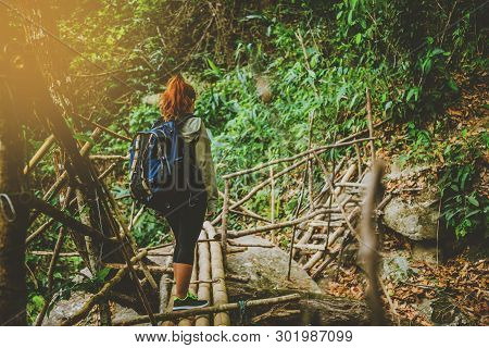 Woman Asia Travelers Travel Nature Forests, Mountains, Waterfalls. Asian Woman Travel Nature. Travel