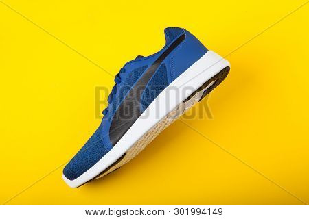 Varna , Bulgaria - April 24, 2019 Puma St Trainer Evo Knit Sport Shoe On Yellow Background. Puma Is 
