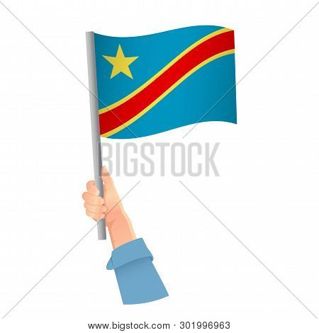 Democratic Republic Of The Congo Flag In Hand. Patriotic Background. National Flag Of Democratic Rep