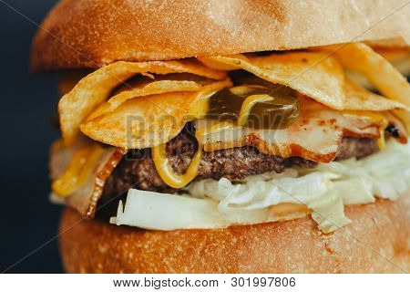 Burger Flyer. Cheese Burger With Grilled Meat, Cheese, Salad And Onion Rings. Close-up Of Delicious 