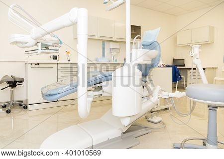 Interior Of The Dental Office With A Chair And Tools For Dental Treatment.