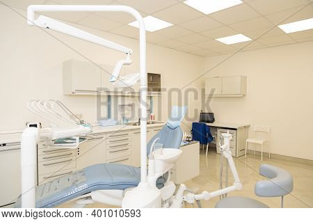 Interior Of The Dental Office With A Chair And Tools For Dental Treatment.