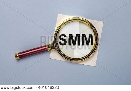 Smm Acronym Inscription Through Manifying Glass, Lens