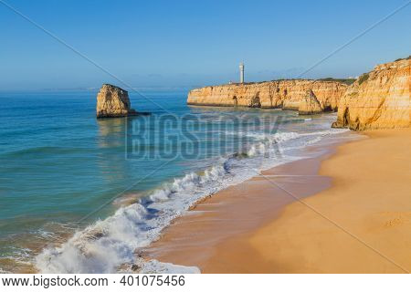 The famous beach of Praia dos Caneiros. This beach is a part of famous tourist region of Algarve.