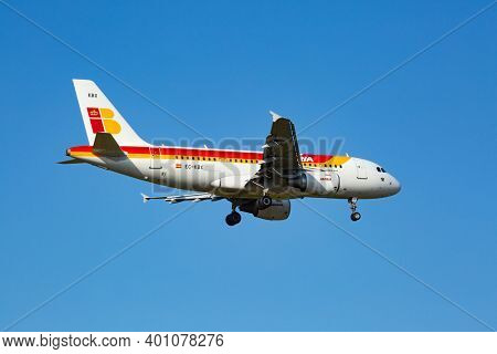 ZURICH - JULY 18: Airbus A-319 Iberia landing in Zurich after short haul flight on July 18, 2015 in Zurich, Switzerland. Zurich airport is home for Swiss Air and one of biggest european hubs.