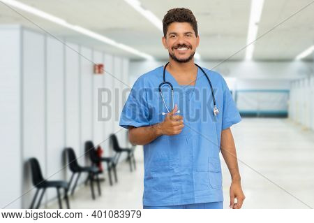 Laughing Doctor With Beard At Vaccination Station Is Ready For Vacinating Patients Against Coronavir