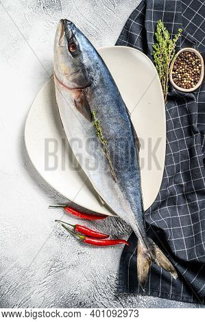 One Piece Of Japanese Amberjack. Raw Fish Yellowtail. Gray Background. Top View