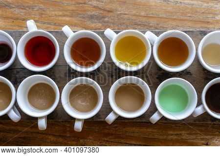 Traditional Balinese Coffee And Tea After Testing On The Wooden Table In Ubud, Island Bali, Indonesi