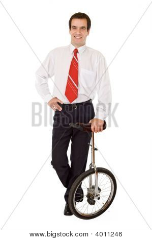 Balance i Business - forretningsmand med Monocycle