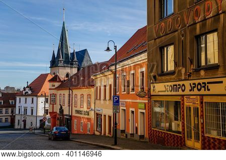 Narrow Picturesque Street With Colorful Buildings In Historic Center In Medieval City Slany, Renaiss