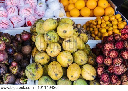 tropical fruits at the market on a street