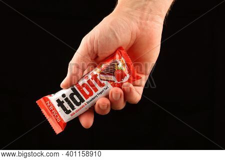 Lviv, Ukraine - December 15, 2020: Tidbit Chocolate Bar In Hand