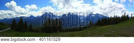 Panoramic View: Beautiful Lake Louise And Mountain Range In Banff Nationalpark In Alberta, Canada. V