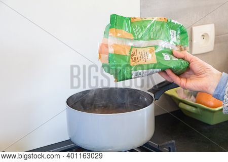 Primelin - France, January 22, 2020 : Put Fiorini Pasta In Boiling Water The Saucepan
