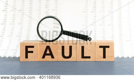 Wooden Blocks With The Text: Fault. Fault Word Made With Building Blocks, Business Concept