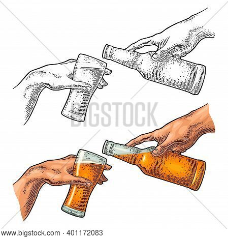 Male Finger Pouring Beer From Bottle Into Glass. The Creation Of Adam.