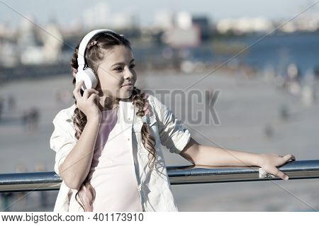 City Guide And Audio Tour. Girl Little Tourist Kid Explore City Using Audio Guide Application. Free 
