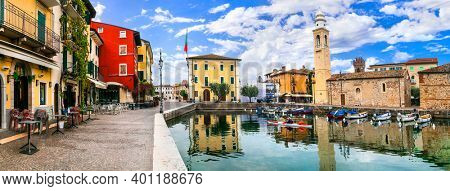 Scenic village Lazise with colorful houses, lake Lago di Garda. Veneto region. nov. 2020 Italy