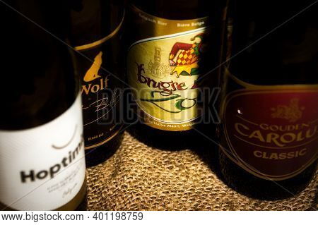 Belgian Speciality Beers Brugse Zot, Wolf Carte Blanche, Gouden Carolus And Hoptimist.