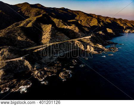 Aerial View. Road Along Spanish Rocky Shoreline. Mediterranean Region Of Villaricos, Almeria, Easter