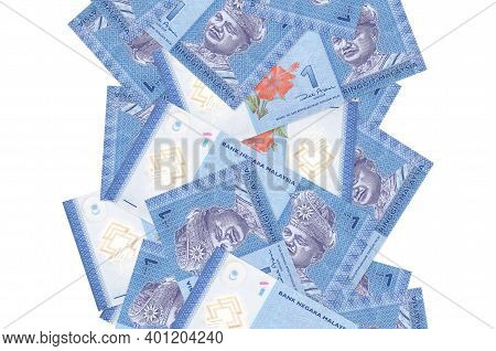 1 Malaysian Ringgit Bills Flying Down Isolated On White. Many Banknotes Falling With White Copy Spac