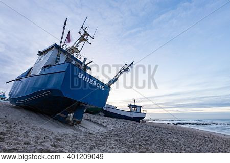Uniescie, West Pomeranian Voivodeship Poland - December, 26, 2020: Fishing Boats On The Seashore. A
