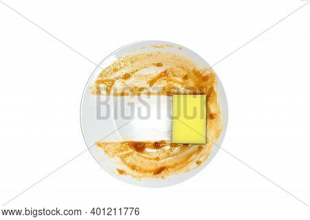 White Round Dirty Plate With Red Sauce, Yellow Foam Sponge Cleaning Dish Top View , Isolated On Whit