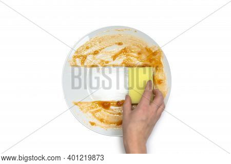 White Round Dirty Plate With Red Sauce, Yellow Foam Sponge Cleaning Dish Top View , Isolated On Whit